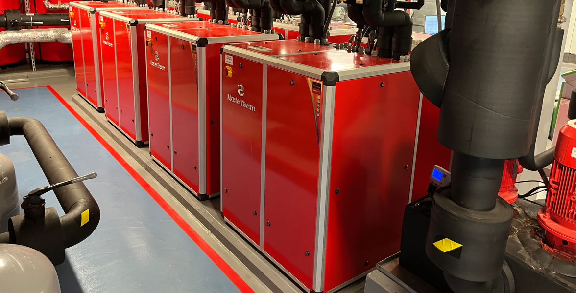 Particle accelerator cooling at the Institute of Nuclear Physics