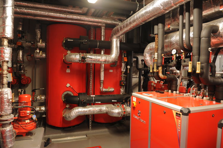 Particle accelerator cooling at the Institute of Nuclear Physics