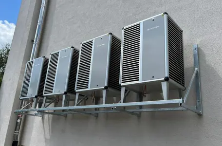 Cascade of Heat Pumps on the Facade of an Apartment Building